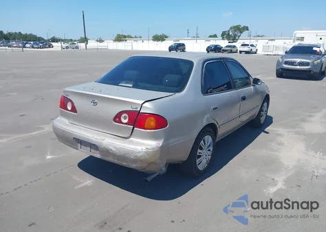 2001 Toyota Corolla Le z USA, uszkodzony, nr VIN 2T1BR12E01C396970